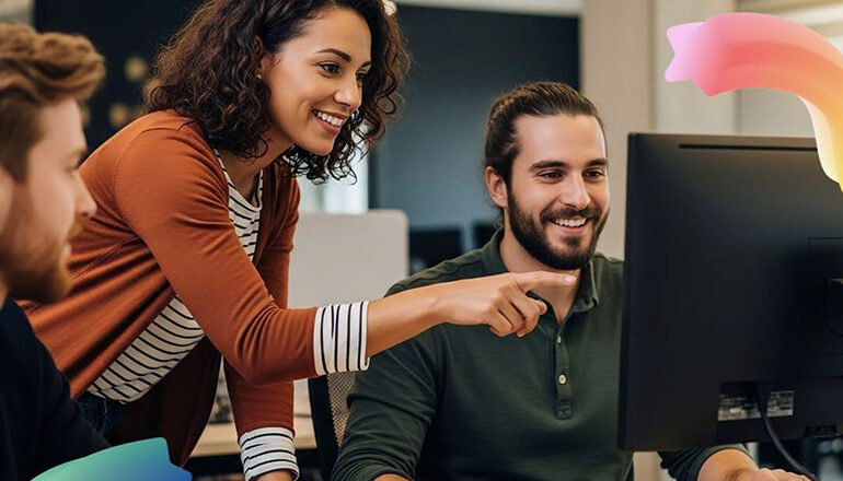 People coding on desktop.