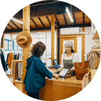 Woman in the counter assisting the customer