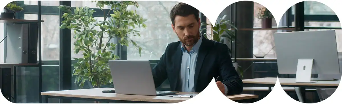 Man on laptop working.