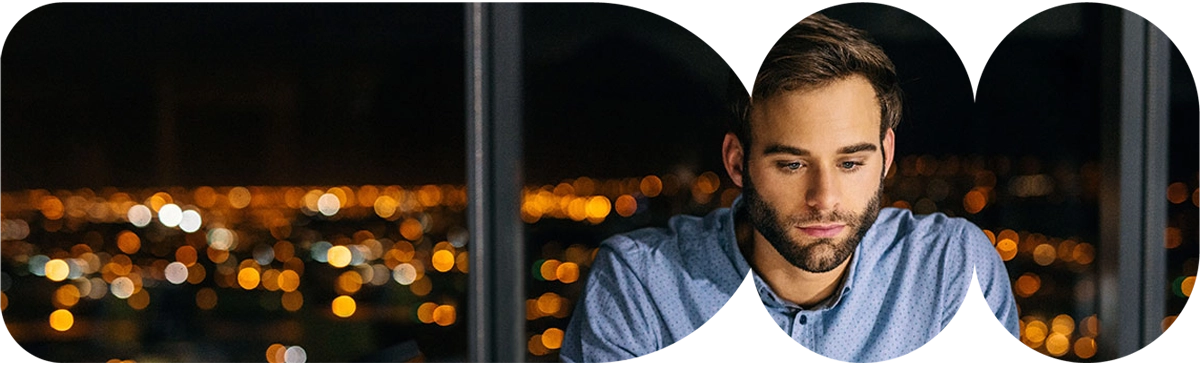 Man on laptop.