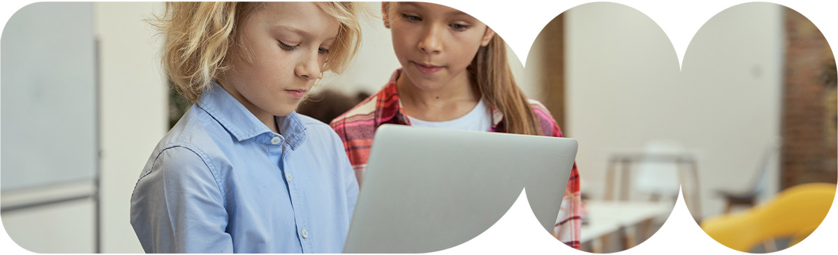 Kids on laptop.