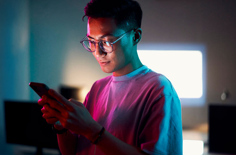 Business professional reviewing regulatory compliance information on computer
