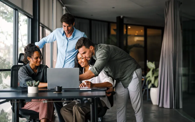 Business professional using automated workflows and self-service tools. 