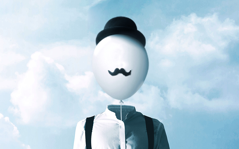 man with balloon head