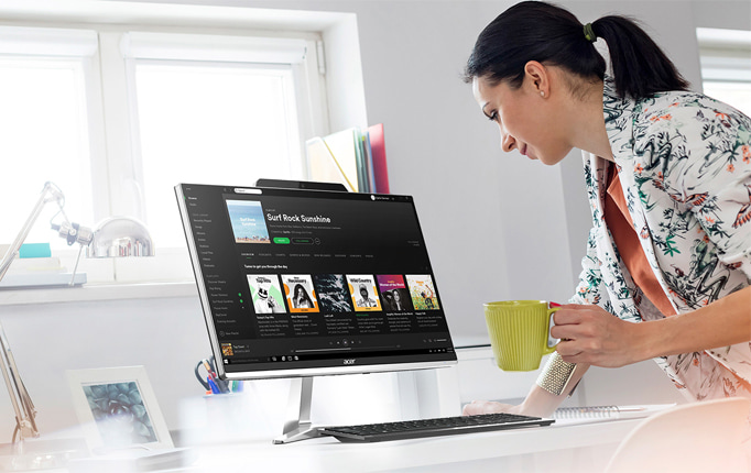 Woman using an Acer Desktop PC