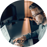 Business person working late on laptop