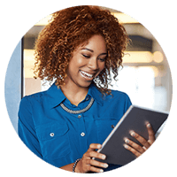 Smiling business woman on tablet computer