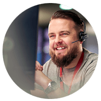 Man smiling while on headset