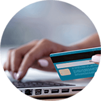 Close up of user using credit card online