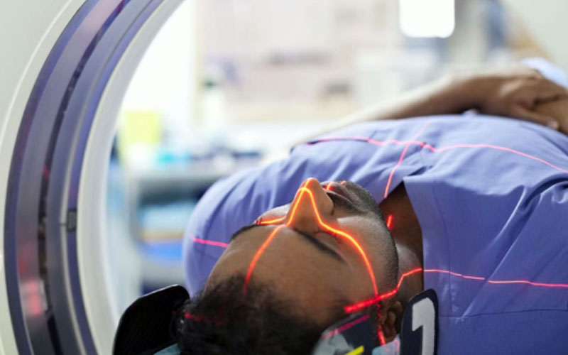 Person getting a x-ray scan at the doctors office.