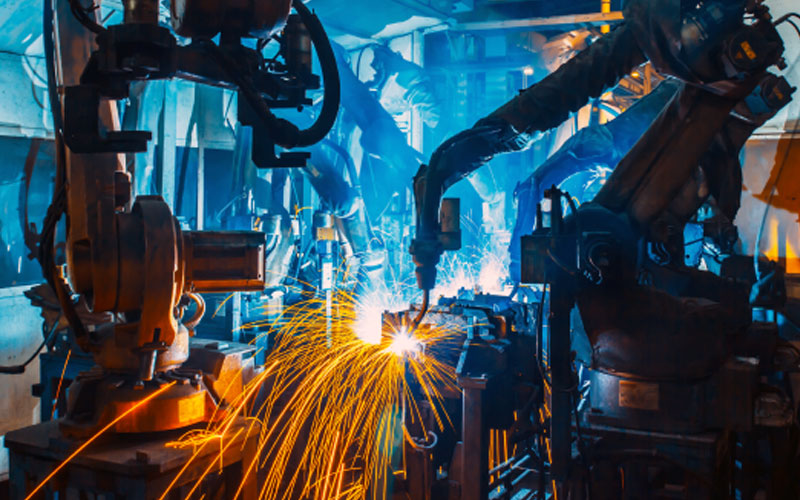 Manufacturing machine working on project.