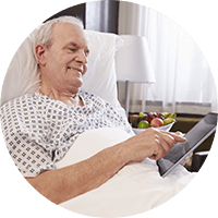 Male patient using a tablet