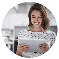 Smiling business woman on tablet computer