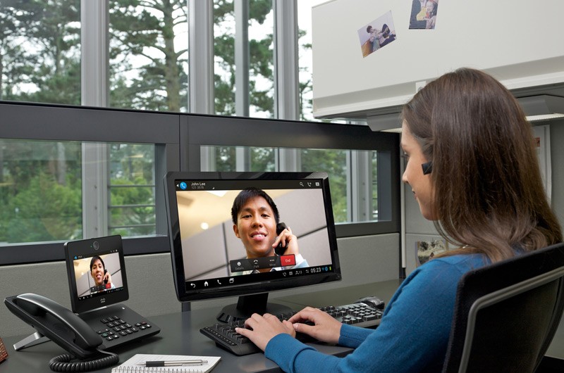 Business woman on video conference with tech support.