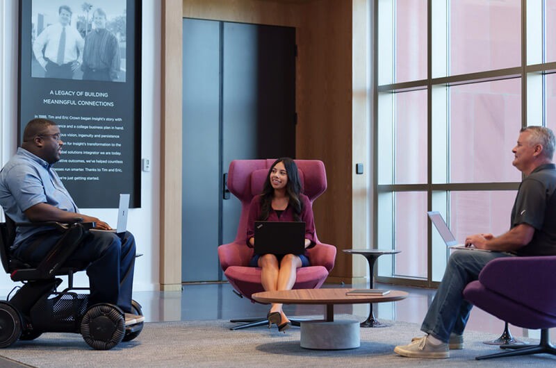 Diverse group of business professionals meet to have a collaborative meeting