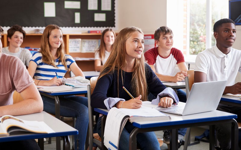 students participating in classroom discussion