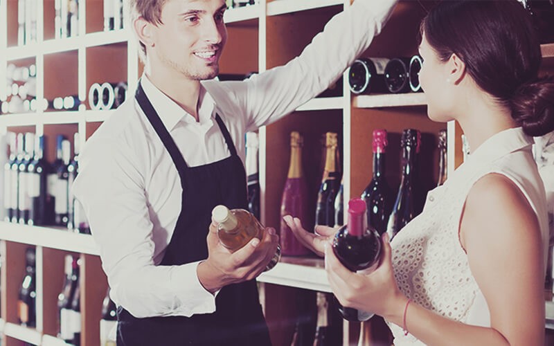 Two person talking about wine