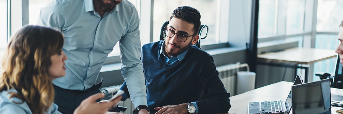 Employees working on laptop