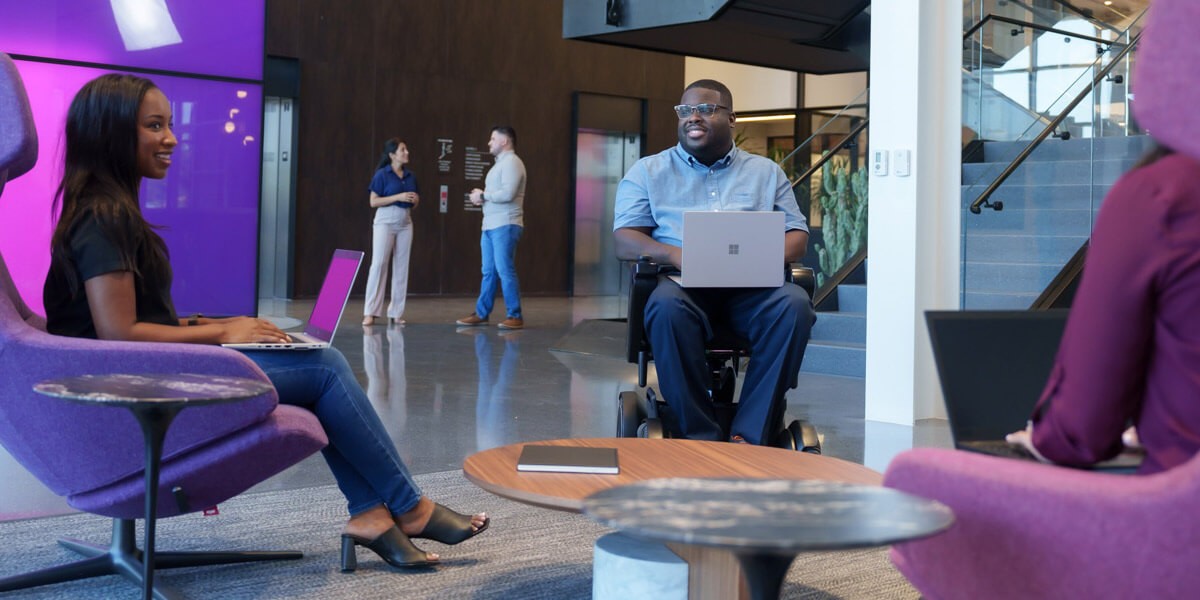 Insight teammates meet 1for a discussion in Insight's modern office in Chandler, AZ