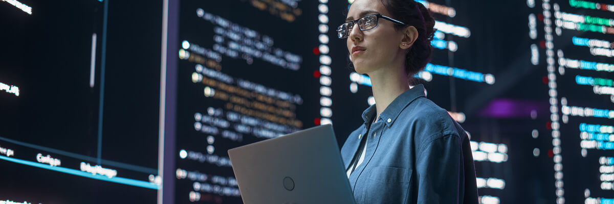 Your AI Is Failing Before It Starts. Here's Why Girl in data center on laptop.