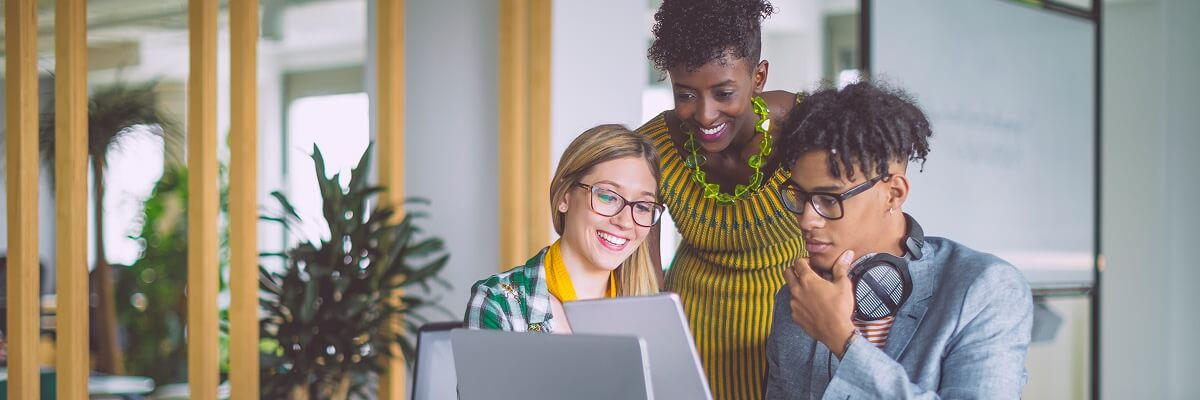 AI agents in the workplace: 3 ways Gemini Enterprise acts as your workplace “do-engine” People working on a laptop