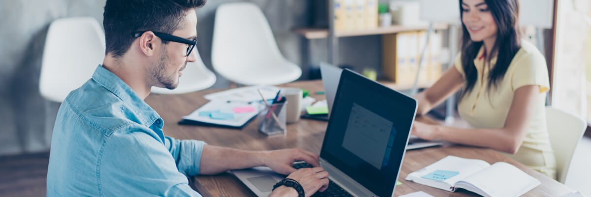 Users collaborating at monitor