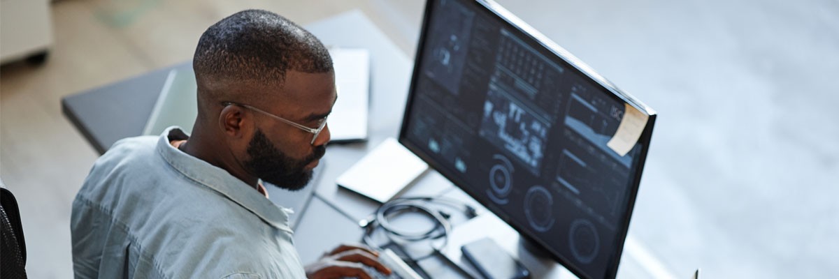 Business professional working on desktop computer