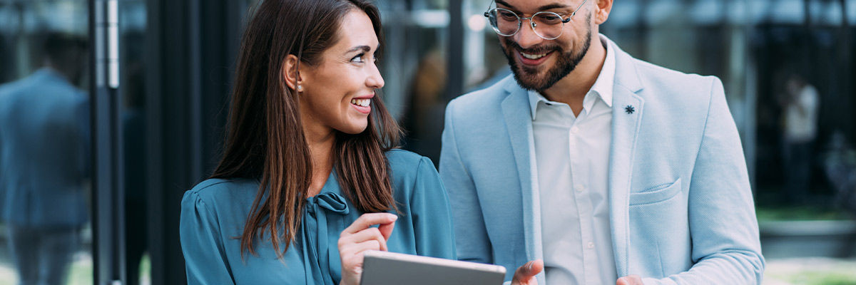 People looking at a tablet