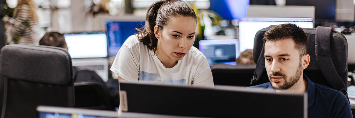 People looking at computer