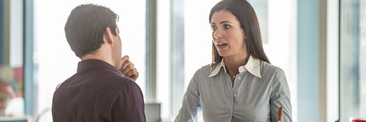 People in a serious conversation