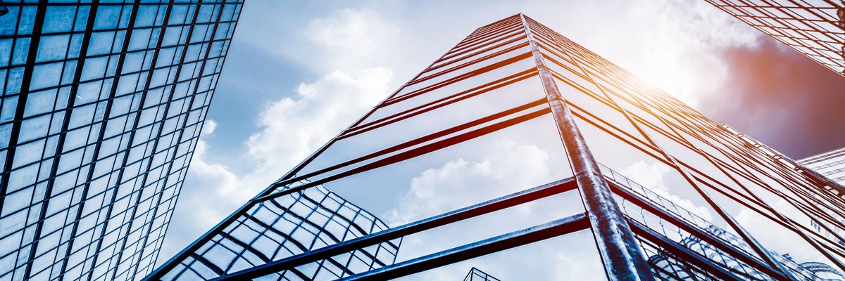 American Multinational Conglomerate Leverages Comprehensive Technology Update for Enhanced Security and Compliance View of city skyscrapers