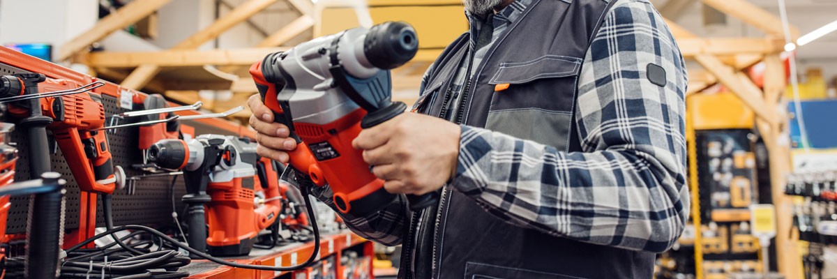 Woman on tablet device in retail store environment 