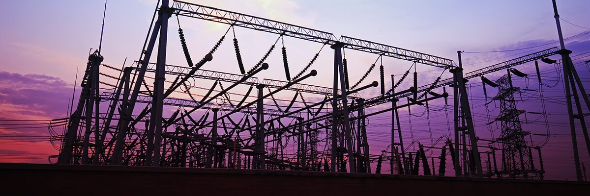 Electrical towers with sunset in background