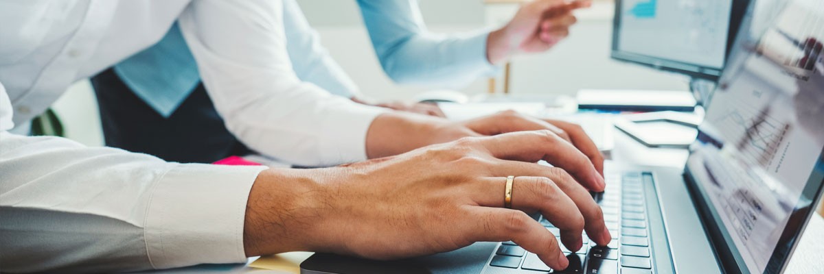 Close up of nonprofit workers analyzing data