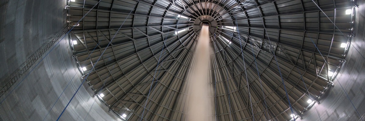 Tractor in grain mill sorting grain