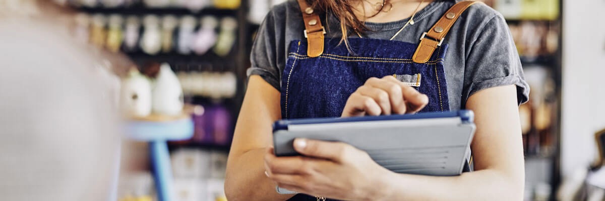 Customer support rep on mobile device. Apple financial services, customized device procurement, device workflow challenges, device lifecycle services, reserved inventory, device refresh