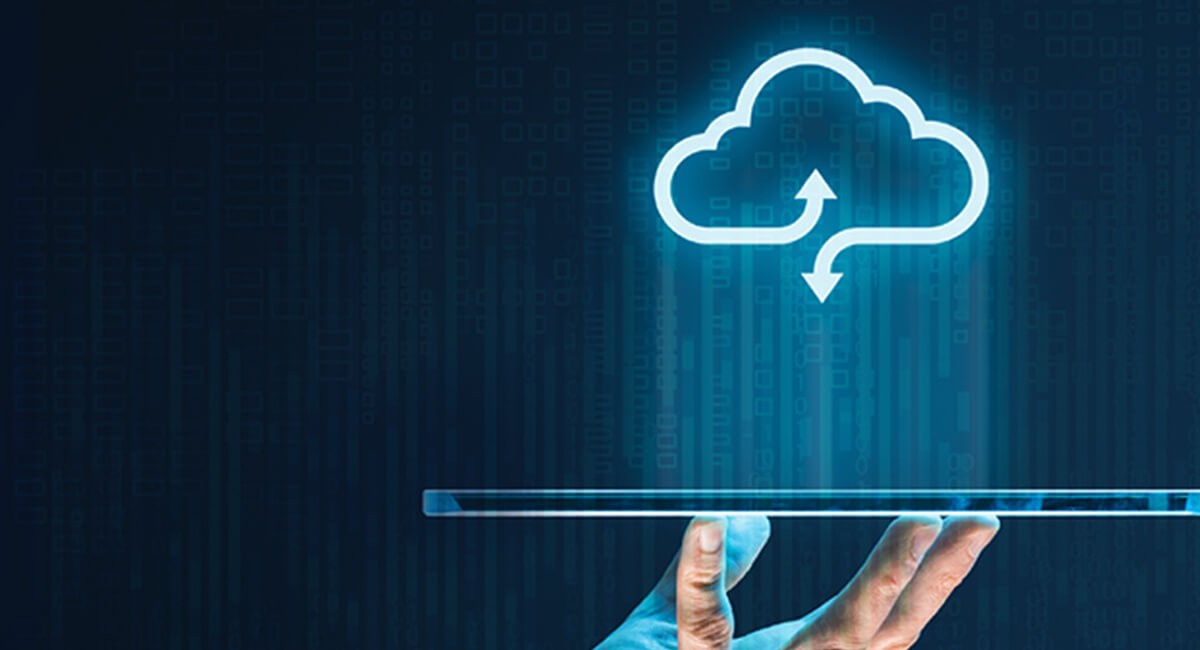 Holographic cloud displayed over a flat computer tablet held at fingertips