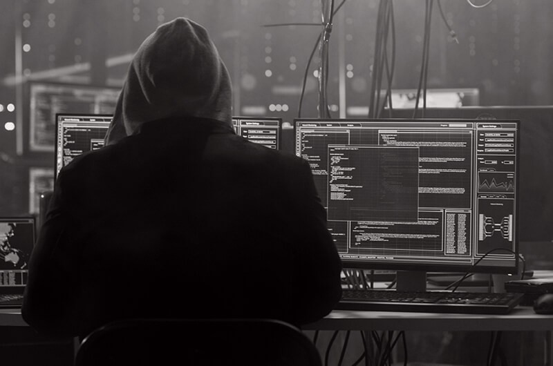 Hacker lurking in the shadows. Cybersecurity 