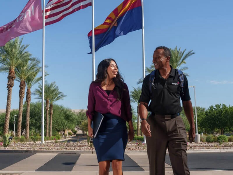 New workforce walking into modern office building