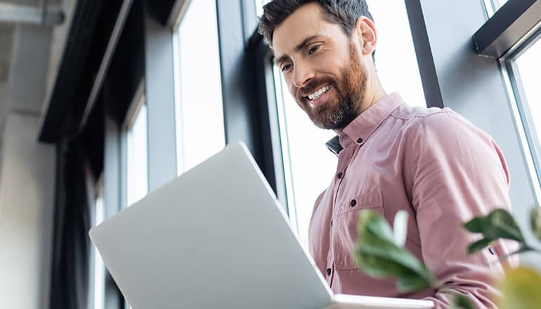 Businessman using ChromeOS on laptop device. ChromeOS, enterprise devices, operating system, ChromeOS devices, ChromeOS for business