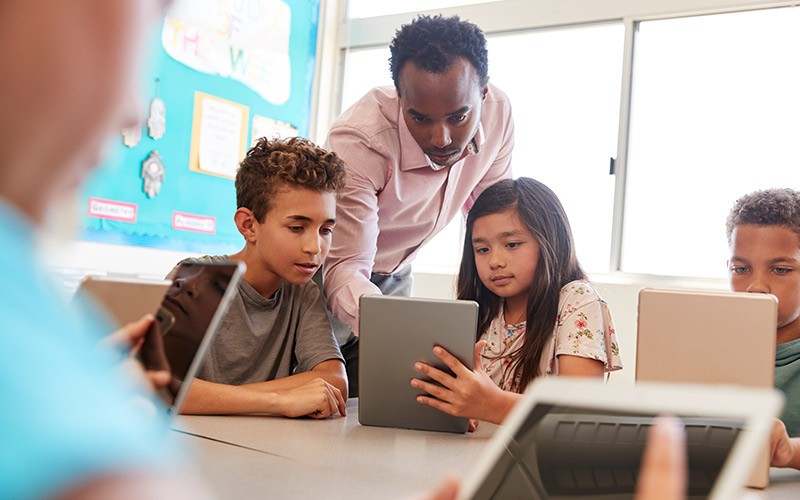 Students and teacher in classroom 
