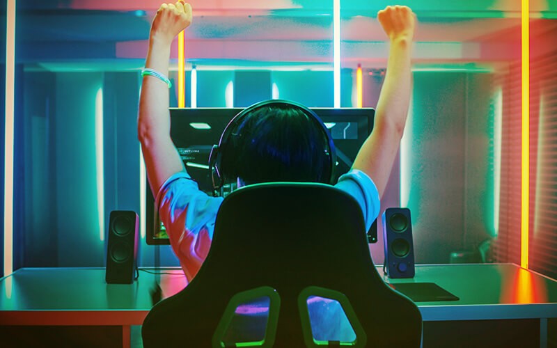 Man playing using gaming pc