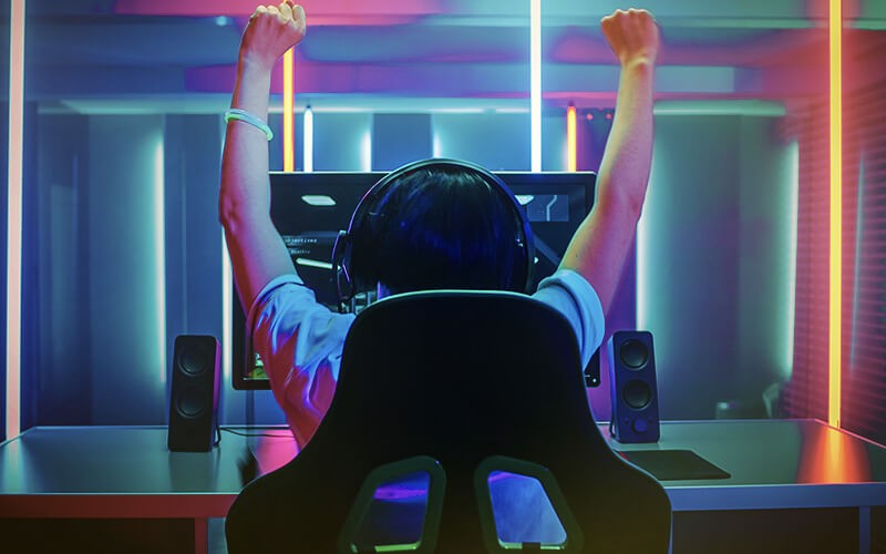 Man playing using gaming pc