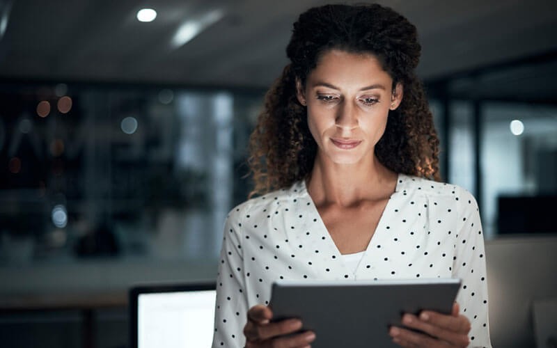 Woman holding tablet device