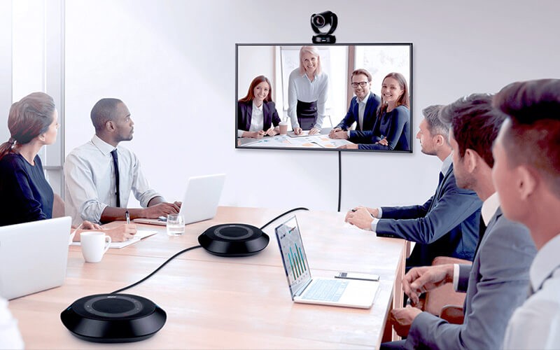 Teammates collaborating together using a AVer VC520 Pro 2