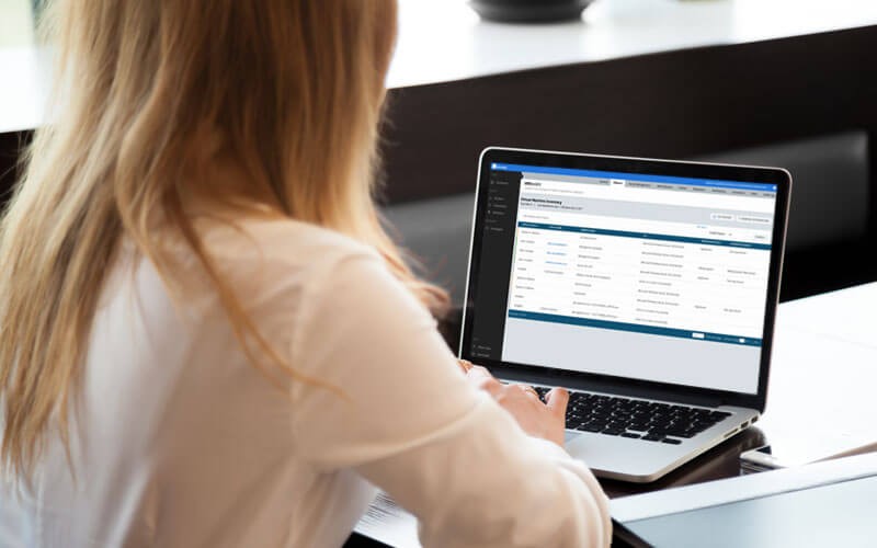 Woman on laptop with Carbon Black Defense for VMware 