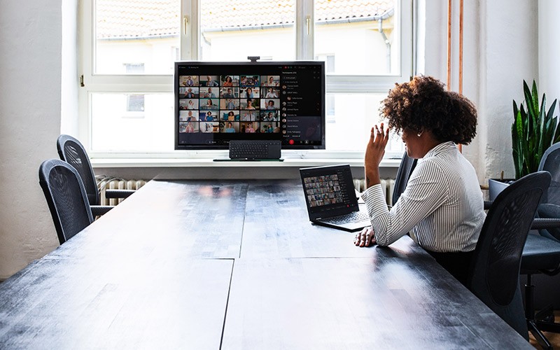 Woman using Cisco call control solution