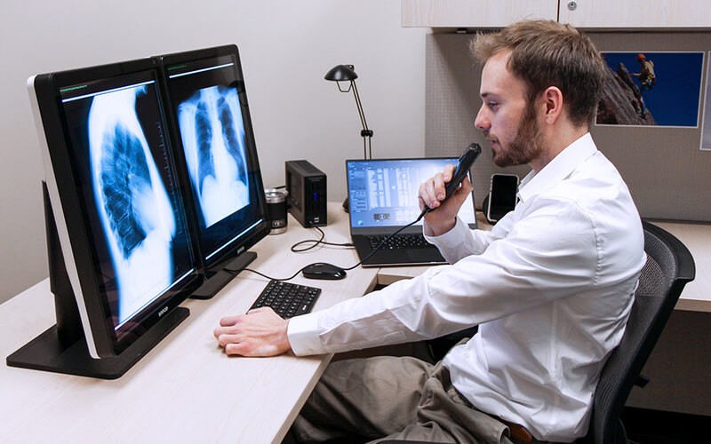 Man checking the xray results