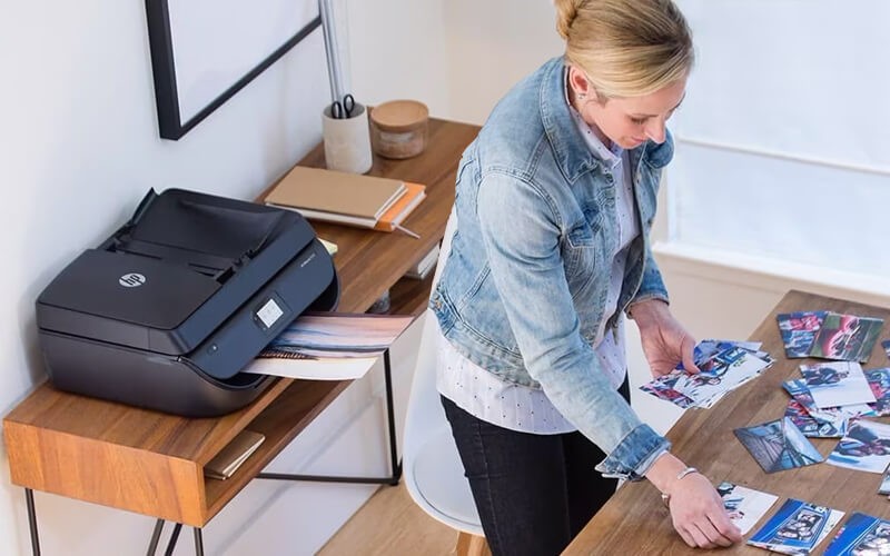 Woman printing picture using HP printer