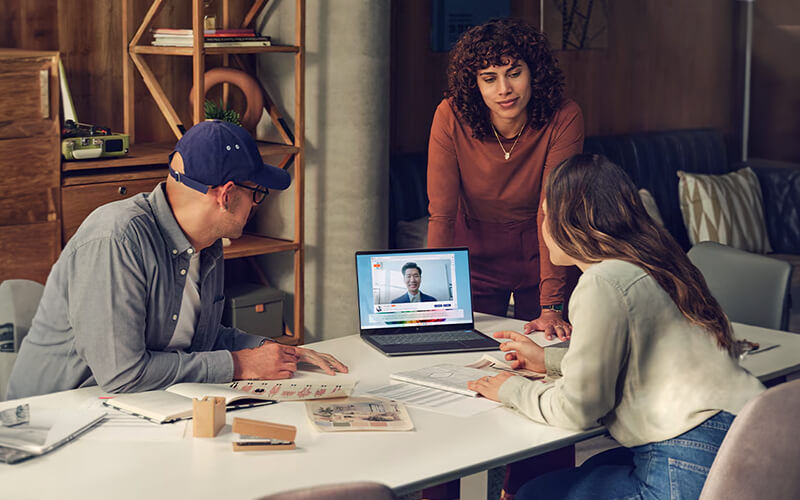 Business man working on HP monitor and workstation
